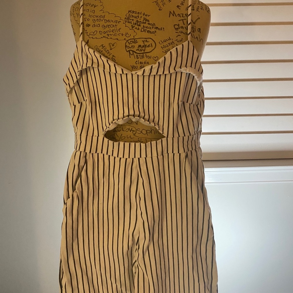 Black and white striped jump suit